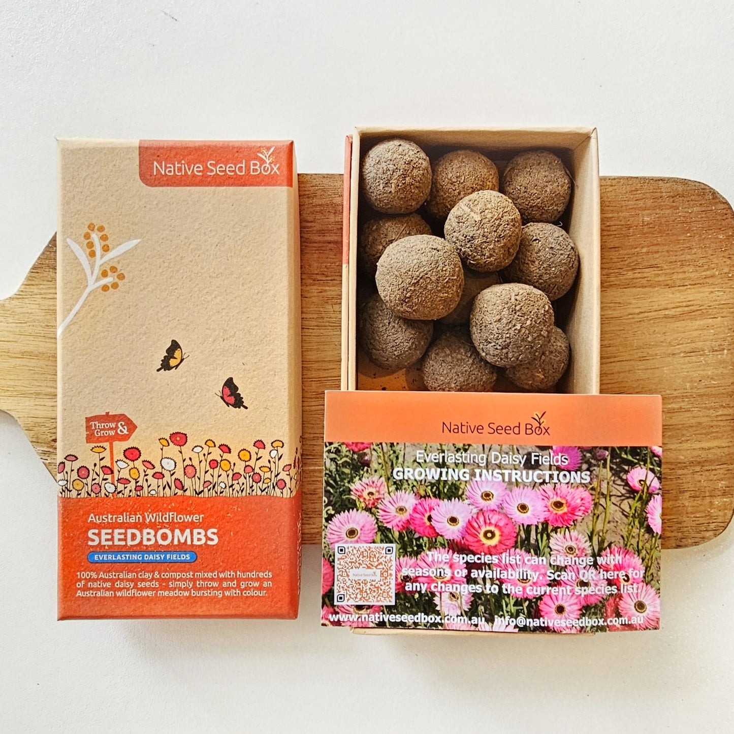 Contents of Native Seed Box Everlasting Daisy Fields including seed bombs and growing instructions - perfect for sustainable gardening, promoting native plant growth, and enhancing garden biodiversity