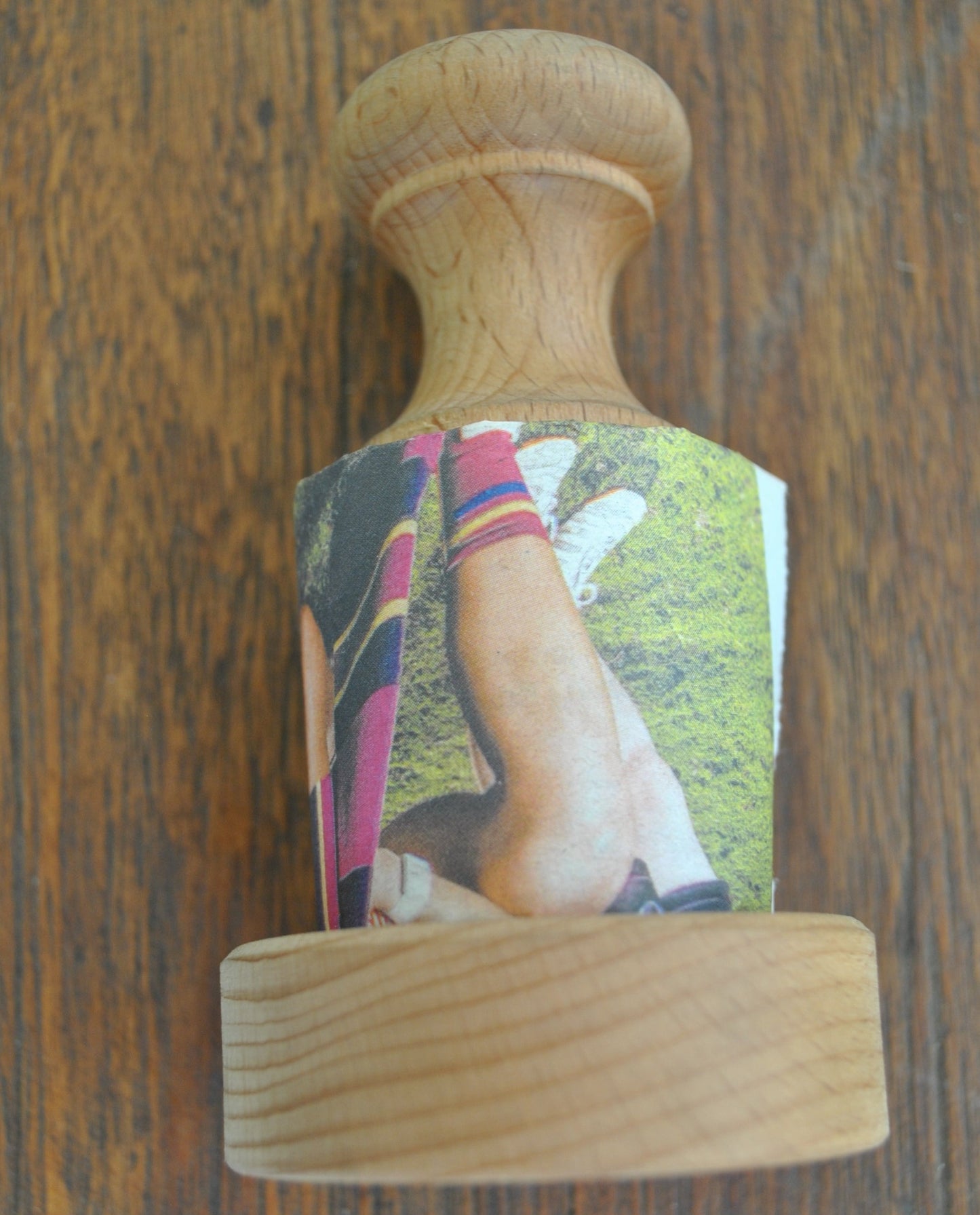 Making newspaper pots with pot maker lying down
